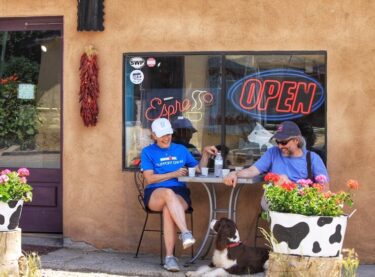Diners outside the Taos Cow