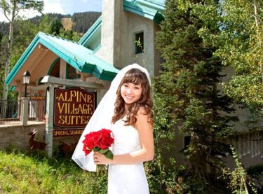 A woman in her wedding dress in the Ski Valley
