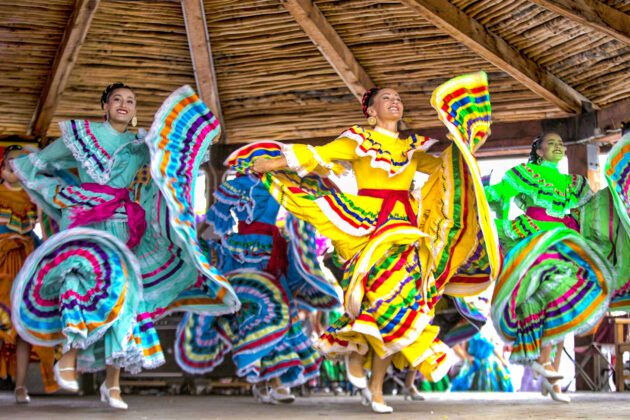 Dancers in traditional clothing at Fiestas de Taos