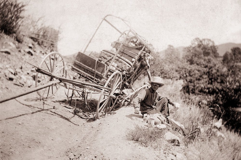 Bert Geer Phillips and Ernest Blumenschein with a Broken Wagon Wheel